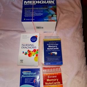 Various nursing textbooks and items